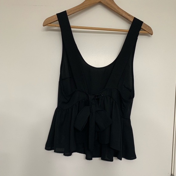 Black peplum tank with bow tie detail in back - Picture 2 of 3